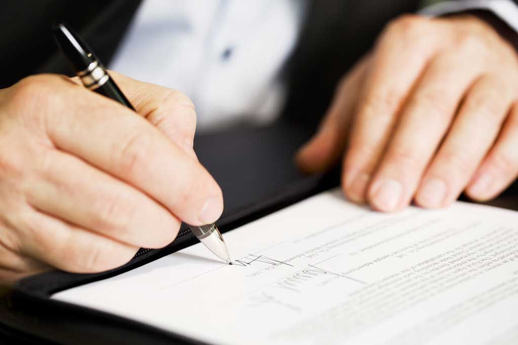Firma de contrato ante notario